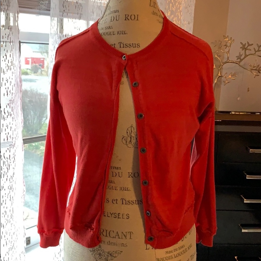 Robert Rodriguez orange cardigan